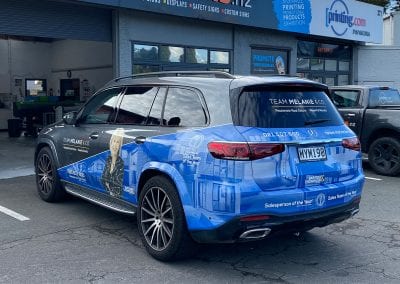 Melanie Broodryk custom branded partial vehicle wrap for mobile business car