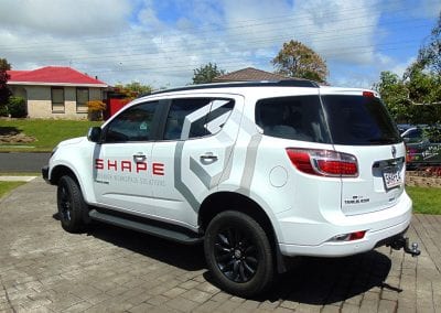 Shape commercial vehicle signage clean logo layout for company van